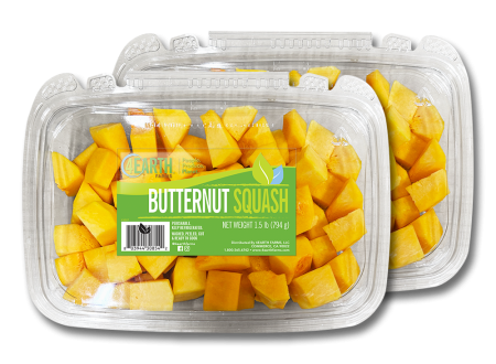 A pair of diced butternut squash packaging, clamshells with labels on the lid